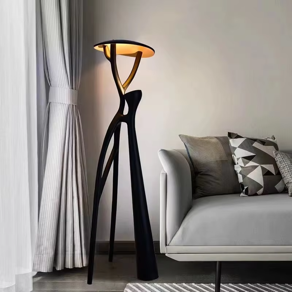 This is a modern artistic human-shaped floor lamp with a black creative human-like bracket and a wooden top lamp plate. It features a highly artistic design with a modern sense. It is used for space lighting and decoration, creating an artistic and distinctive ambiance. It is suitable for modern art-style home living rooms, creative studios, high-end art galleries and other places.
