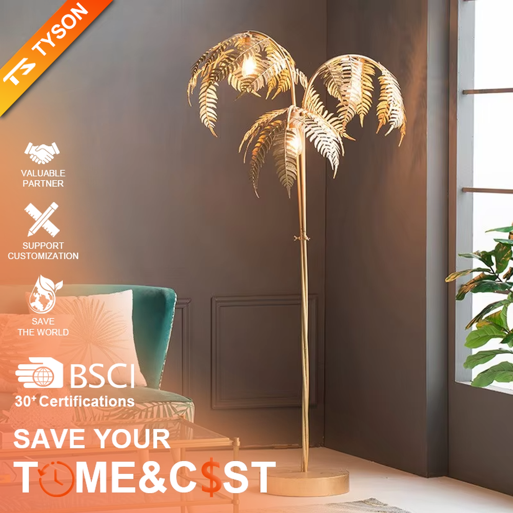 This is a tropical artistic floor lamp with golden palm leaf-shaped lamp heads and a metal pole, featuring a strong tropical artistic sense. It is used for space lighting and decoration, creating a tropical artistic atmosphere. It is suitable for tropical-style home living rooms, creative cafes, art homestays and other places.