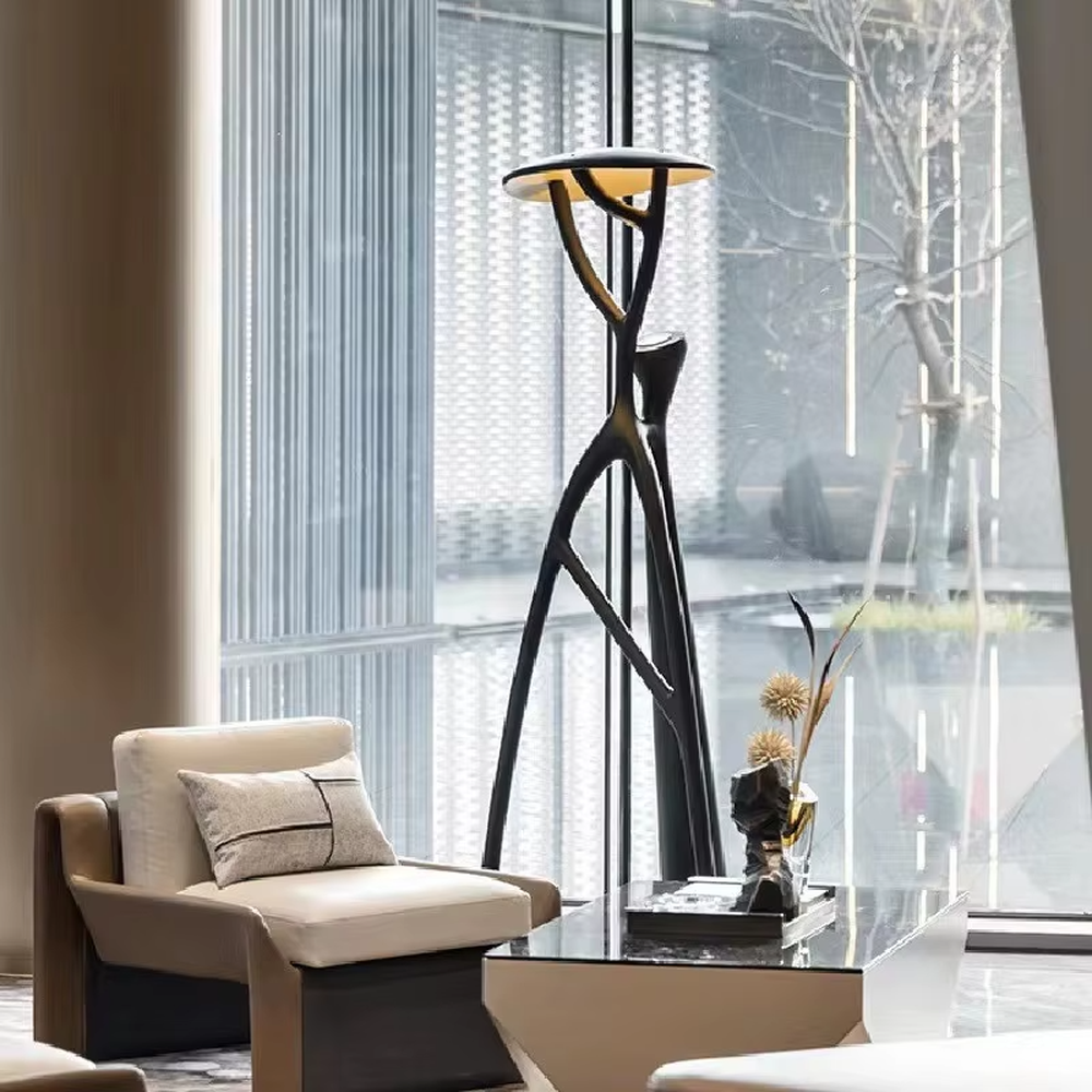 This is a modern artistic human-shaped floor lamp with a black creative human-like bracket and a wooden top lamp plate. It features a highly artistic design with a modern sense. It is used for space lighting and decoration, creating an artistic and distinctive ambiance. It is suitable for modern art-style home living rooms, creative studios, high-end art galleries and other places.
