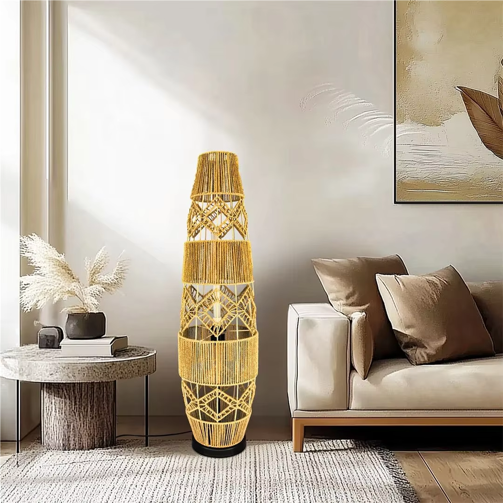 This is a natural retro-style rattan floor lamp, with a multi-layer geometric woven rattan structure, featuring a natural artistic sense and warm rustic texture. It is used for space lighting and decoration, creating a natural and warm retro atmosphere. It is suitable for natural-style home living rooms, homestay leisure areas, Southeast Asian-style restaurants and other places.