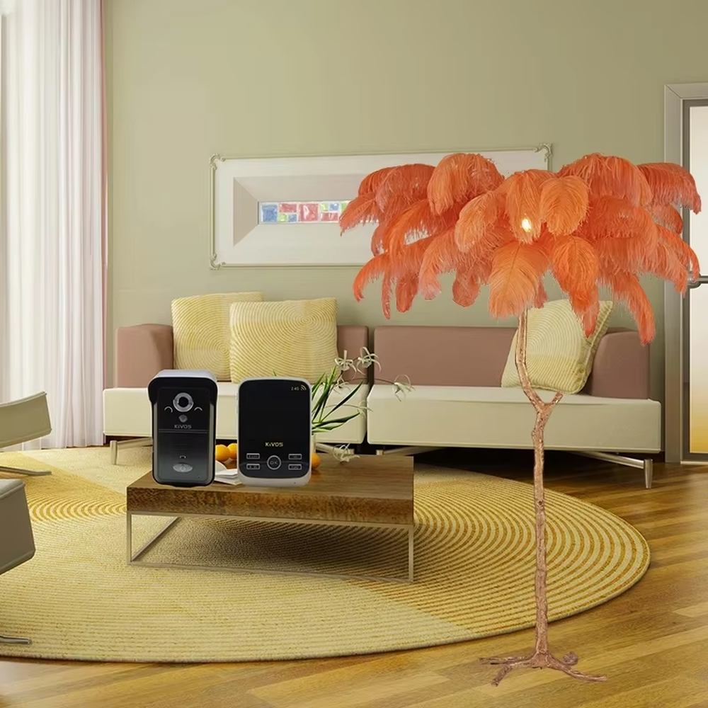 This is a light luxury artistic feather-shaped floor lamp, with a golden branch-shaped metal bracket and numerous pink ostrich feathers. It features a romantic and luxurious design, with warm and soft lighting. It is used for space ambient lighting and decoration, creating a romantic artistic atmosphere. Suitable for light luxury-style bedrooms, internet-famous check-in shops, art homestays and other places.