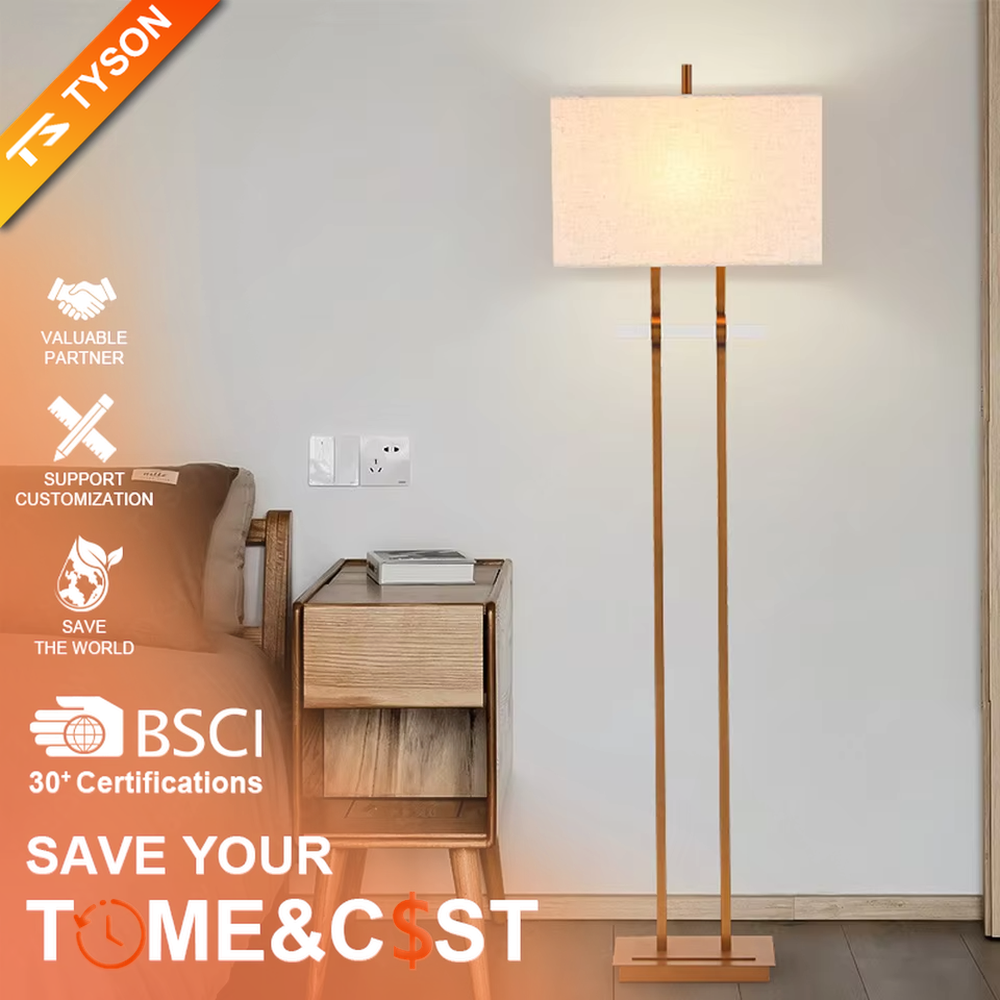This is a modern minimalist metal double-pole floor lamp, with golden metal double poles and a beige fabric square lampshade, featuring a minimalist and grand design, modern style. It is used for space lighting and decoration, creating a minimalist and warm atmosphere. It is suitable for modern minimalist home bedrooms, living room corners, studies and other places.