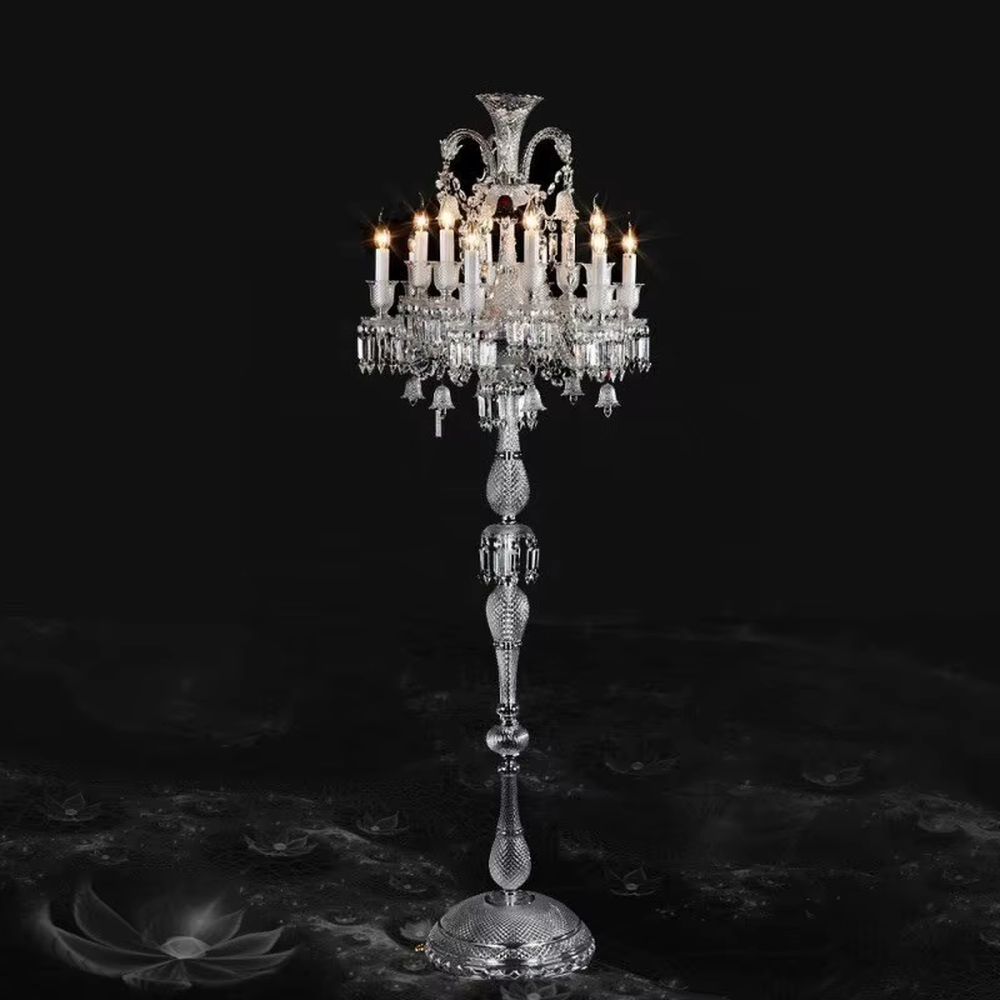 This is a European court luxury crystal floor lamp, made of full crystal material, with multi-layer crystal ornaments and candlestick-shaped lamp heads, featuring a brilliant and luxurious design with strong court luxury texture. It is used for space lighting and decoration, creating a high-end luxurious atmosphere. It is suitable for villa living rooms, high-end hotel banquet halls, European-style clubs and other places.