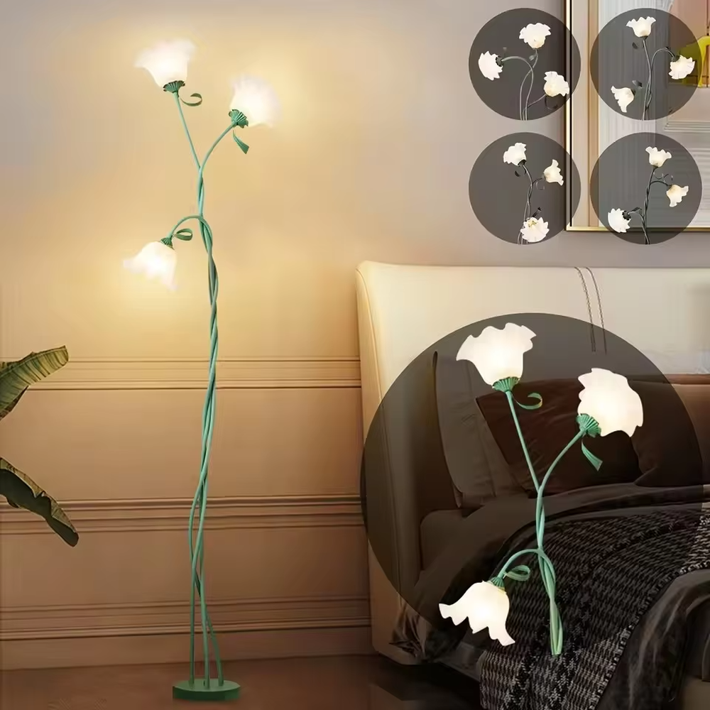 This is a natural artistic flower-shaped floor lamp, with a green spiral metal stand and three white flower-shaped lampshades, featuring a strong natural artistic sense and fresh elegant style. It is used for space lighting and decoration, creating a natural artistic atmosphere. It is suitable for pastoral-style home living rooms, homestay leisure areas, art studios and other places.