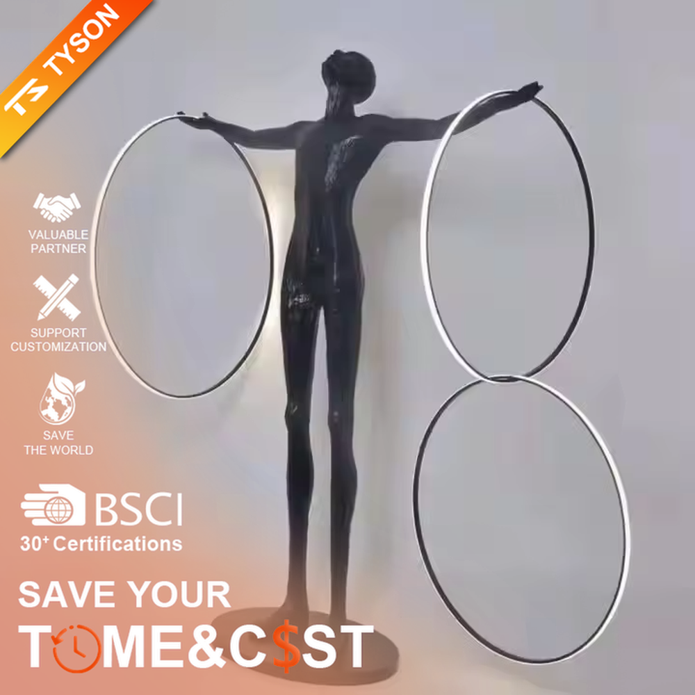 This is an artistic installation-style figure sculpture floor lamp, with a black figure sculpture sitting on a white marble base, holding a circular luminous lamp with both hands, featuring strong artistic sense. It is used for space lighting and artistic decoration, creating a modern artistic atmosphere. Suitable for art exhibition halls, high-end hotel lobbies, corners of modern art home living rooms and other places.