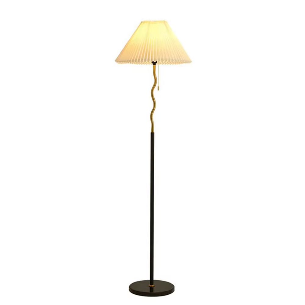 This is a modern minimalist black spherical decorative floor lamp, with a black metal pole featuring spherical decorative elements and a beige pleated fabric lampshade. It has a minimalist and textured design, with soft and warm lighting. It is used for space lighting and decoration, creating a warm and comfortable atmosphere. Suitable for modern minimalist living rooms, bedroom corners, Nordic-style homes and other places.