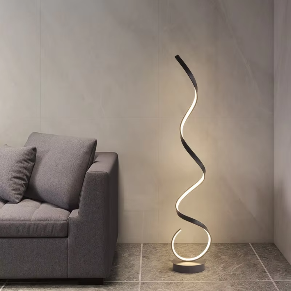 This is a modern artistic spiral floor lamp, with a white spiral shape and a minimalist base, featuring a strong artistic sense and modern style. It is used for space lighting and decoration, creating an artistic atmosphere. It is suitable for modern art home living rooms, designer studios, art exhibition halls and other places.