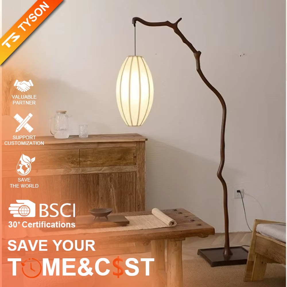 This is a new Chinese Zen-style floor lamp with a dark branch-shaped lamp pole and a beige fabric lantern lampshade. It features a natural and rustic design with a strong Zen sense. It is used for space lighting and decoration, creating a natural Zen ambiance. It is suitable for new Chinese-style home living rooms, Zen teahouses, art homestays and other places.