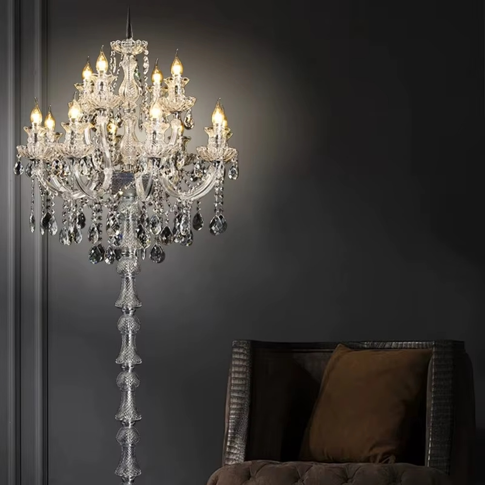 This is a European court luxury crystal floor lamp, made of full crystal material, with multi-layer crystal ornaments and candlestick-shaped lamp heads, featuring a brilliant and luxurious design with strong court luxury texture. It is used for space lighting and decoration, creating a high-end luxurious atmosphere. It is suitable for villa living rooms, high-end hotel banquet halls, European-style clubs and other places.