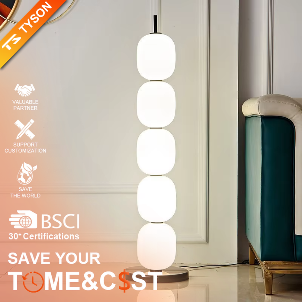 This is a modern minimalist multi-layer spherical glass floor lamp, with a black base and multiple white spherical glass lampshades stacked vertically. It features a minimalist and grand design, with soft and uniform lighting. It is used for space ambient lighting and decoration, creating a modern minimalist and warm atmosphere. Suitable for modern minimalist living rooms, Nordic-style homes, art studios and other places.