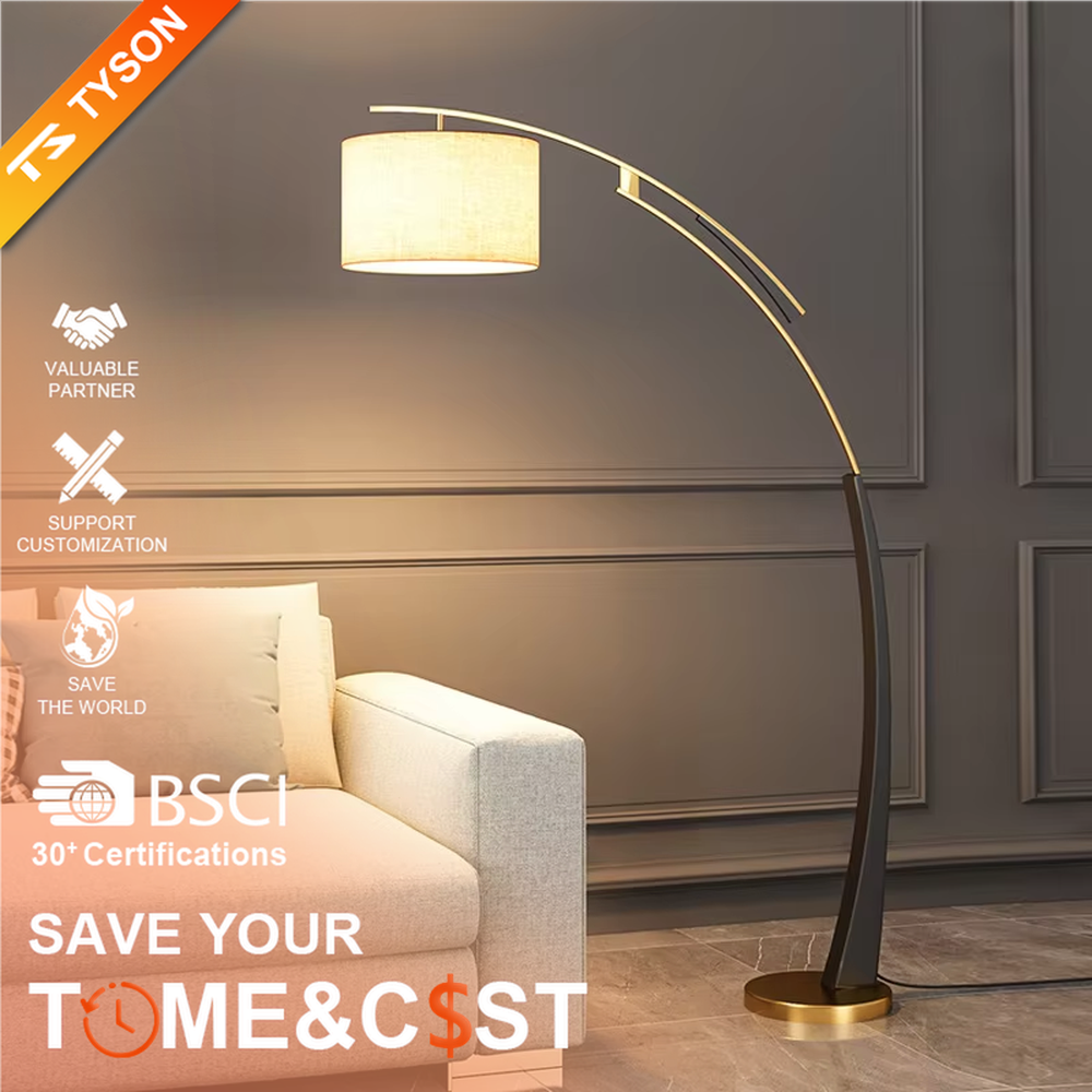 This is a modern arc luxury floor lamp, with a black-gold arc metal stand, a beige fabric cylindrical lampshade, and a golden base, featuring a minimalist and grand design with strong luxury texture. It is used for space lighting and decoration, creating a warm luxury atmosphere. It is suitable for modern home living rooms, luxury-style residences, leisure reading areas and other places.