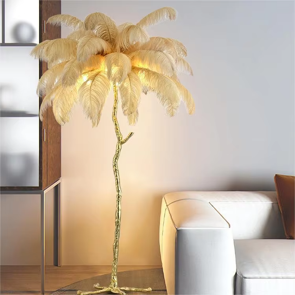 This is a luxurious artistic white feather-shaped floor lamp, with a golden branch-shaped metal bracket and numerous white ostrich feathers. It features a romantic and luxurious design, with warm and soft lighting. It is used for space ambient lighting and decoration, creating a romantic artistic atmosphere. Suitable for light luxury-style bedrooms, internet-famous check-in shops, art homestays and other places.
