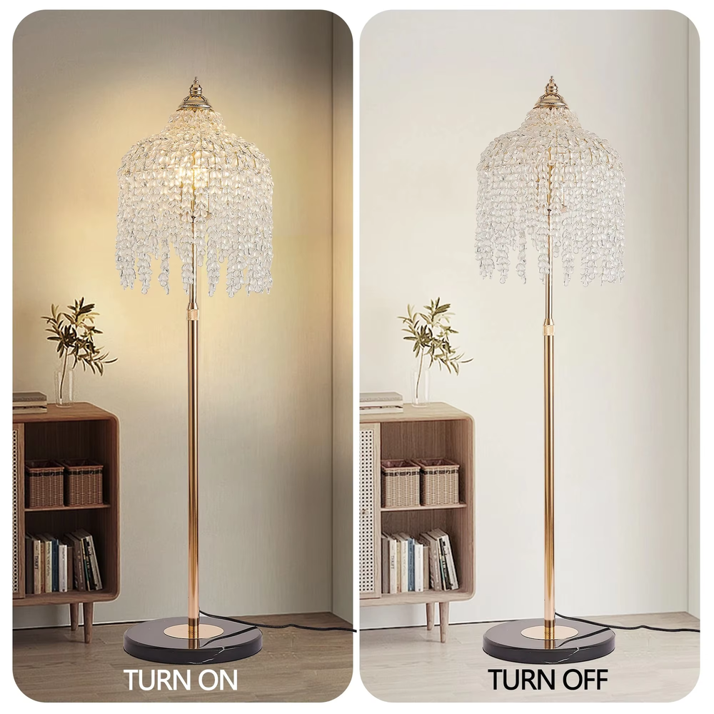 This is a luxury crystal floor lamp with a golden lamp pole, a marble base, and a cascading crystal lampshade. It features a luxurious and elegant design that shines brilliantly under light. It is used for space lighting and decoration, creating a noble and luxurious ambiance. It is suitable for luxury-style home living rooms, high-end hotel leisure areas, luxury villa living rooms and other places.