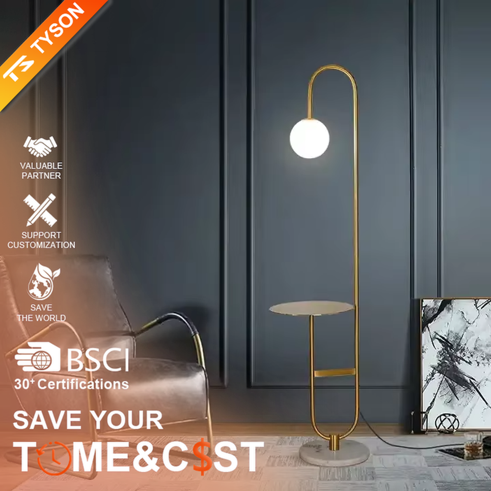 Modern light luxury golden curved floor lamp with table, white spherical lampshade + marble-patterned base, soft lighting, integrating lighting and storage functions, creating a minimalist high-end atmosphere.