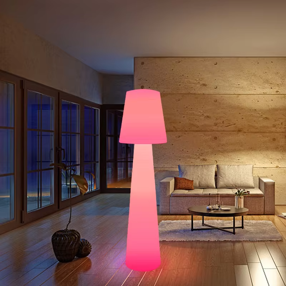 This is a modern ambiance-style fully luminous cone floor lamp, made of bright pink light-transmitting material to create a "small-top-large-bottom" cone shape. With a fully luminous design, its lighting is soft and bright-colored, creating a lively and fashionable space atmosphere.