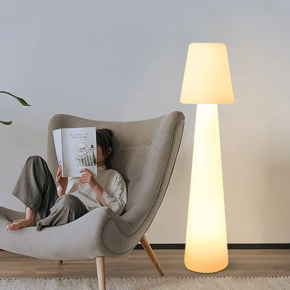 This is an outdoor warm-style conical luminous floor lamp, featuring an integrated conical cylinder + small conical lampshade shape, waterproof material suitable for outdoor environments, soft warm light, creating a comfortable and warm outdoor atmosphere.