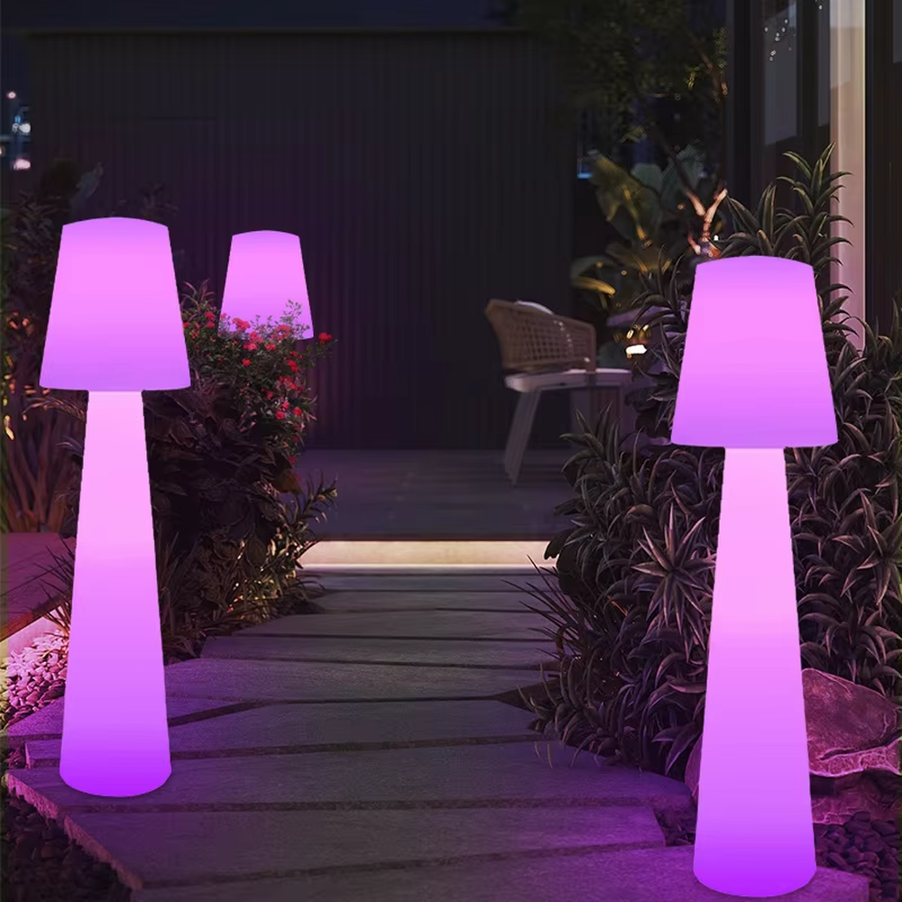 This is an outdoor warm-style conical luminous floor lamp, featuring an integrated conical cylinder + small conical lampshade shape, waterproof material suitable for outdoor environments, soft warm light, creating a comfortable and warm outdoor atmosphere.