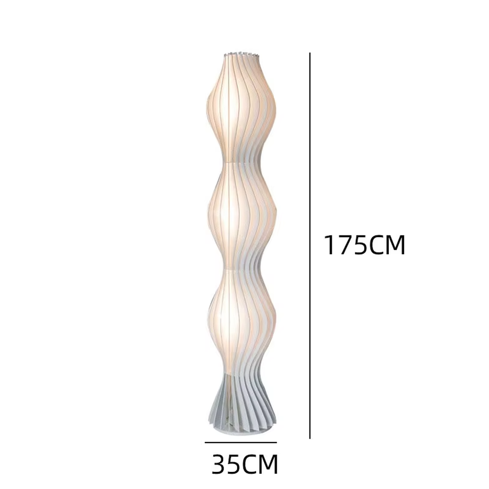 Modern artistic wave-shaped striped floor lamp, light-colored panels spliced into a curved shape, soft and hazy lighting, creating an artistic minimalist atmosphere.
