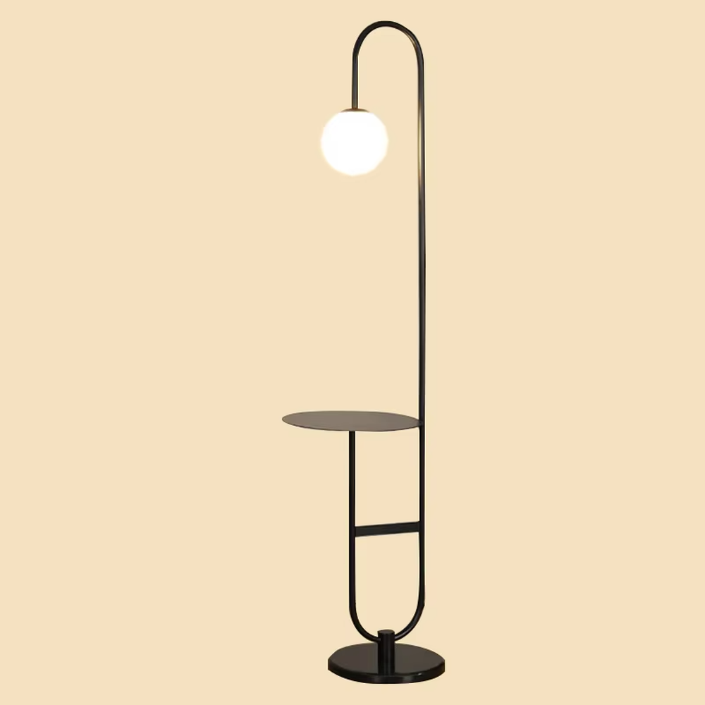 Modern light luxury golden curved floor lamp with table, white spherical lampshade + marble-patterned base, soft lighting, integrating lighting and storage functions, creating a minimalist high-end atmosphere.