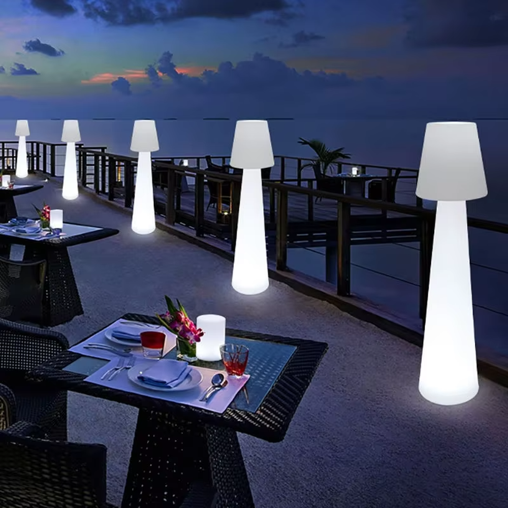 This is a modern ambiance-style fully luminous cone floor lamp, made of bright pink light-transmitting material to create a "small-top-large-bottom" cone shape. With a fully luminous design, its lighting is soft and bright-colored, creating a lively and fashionable space atmosphere.