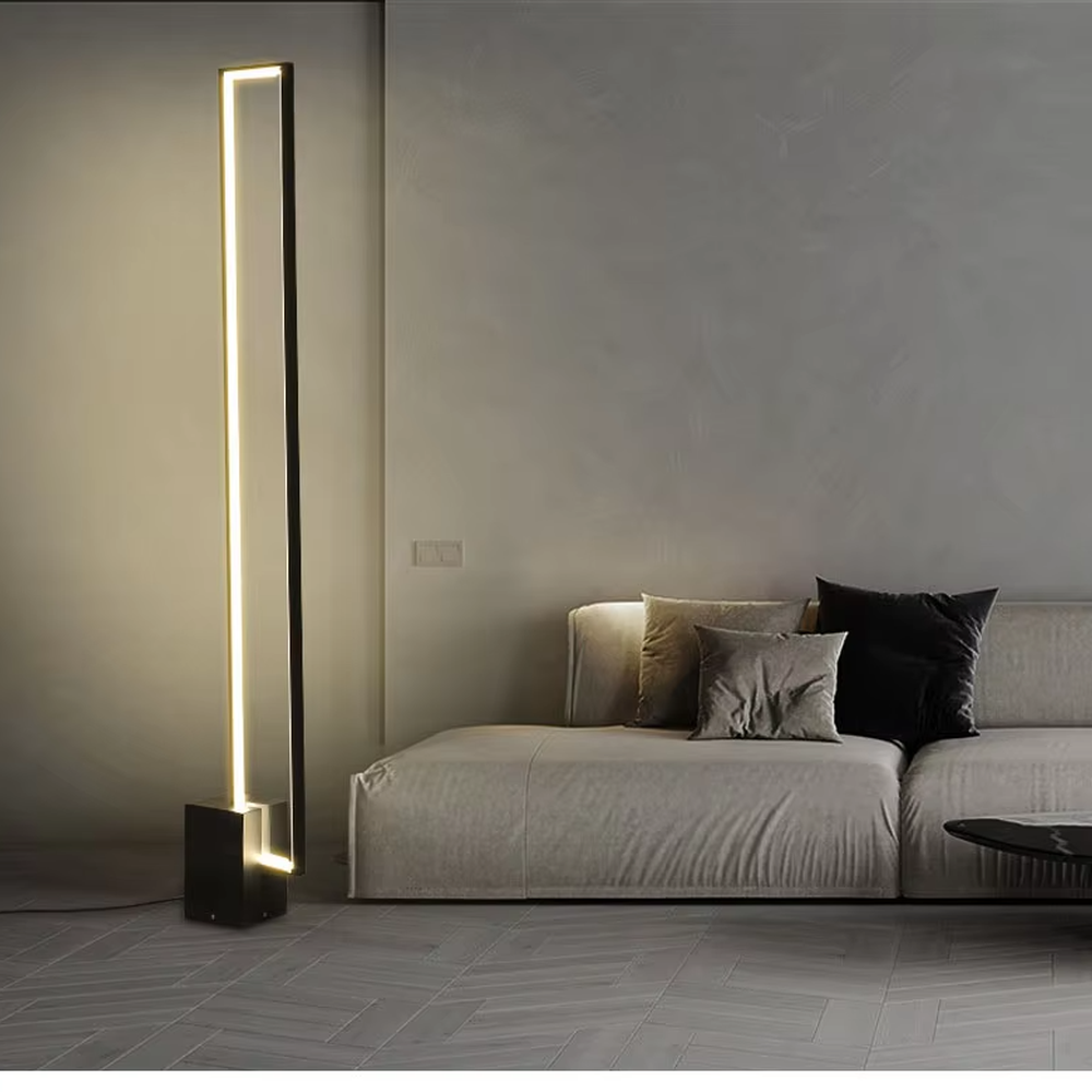 This is a modern minimalist long strip floor lamp, featuring a black frame paired with an embedded long strip light strip. The design has concise and high-end lines, with soft and uniform lighting. It is used for space lighting and decoration to create a modern minimalist atmosphere. Suitable for modern-style living rooms, minimalist bedrooms, high-end apartments and other places.
