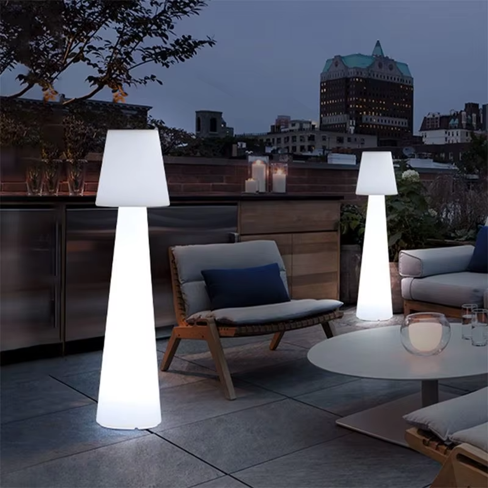 This is a modern ambiance-style fully luminous cone floor lamp, made of bright pink light-transmitting material to create a "small-top-large-bottom" cone shape. With a fully luminous design, its lighting is soft and bright-colored, creating a lively and fashionable space atmosphere.