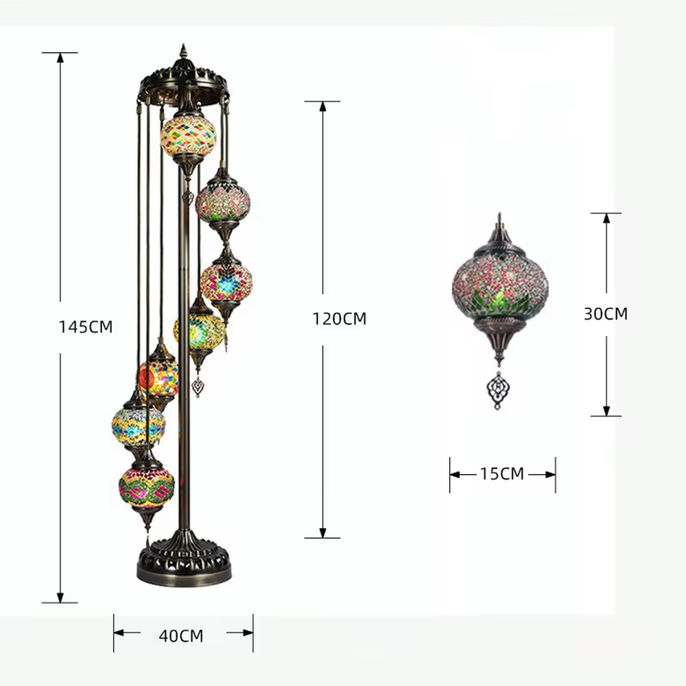 This is an exotic Turkish mosaic floor lamp, with a retro metal stand paired with a dome decoration, hanging multiple colorful mosaic glass balls. The light through the glass presents a soft and colorful effect, creating a strong exotic atmosphere.