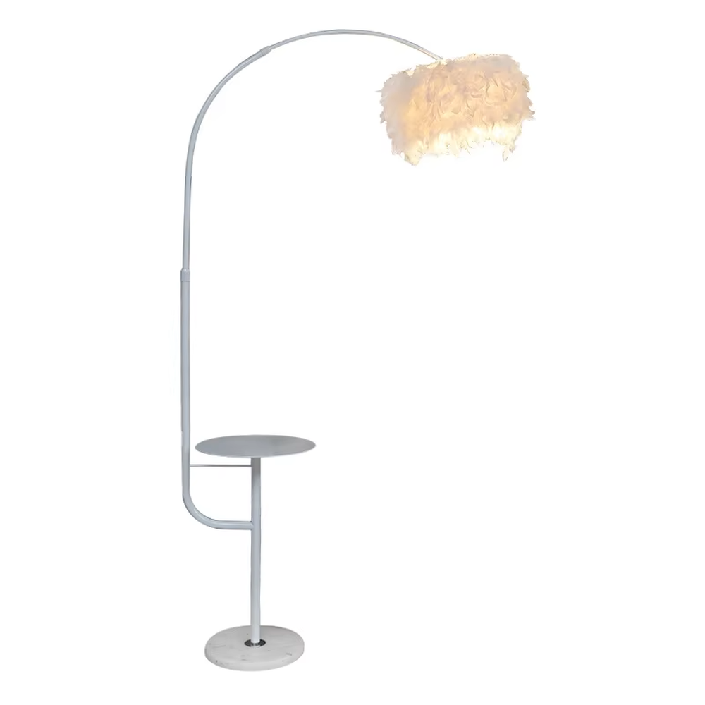 Warm romantic-style white curved feather floor lamp with a small round storage table, white feather lampshade + white lamp pole + round base, soft and warm lighting, creating a comfortable romantic space atmosphere.