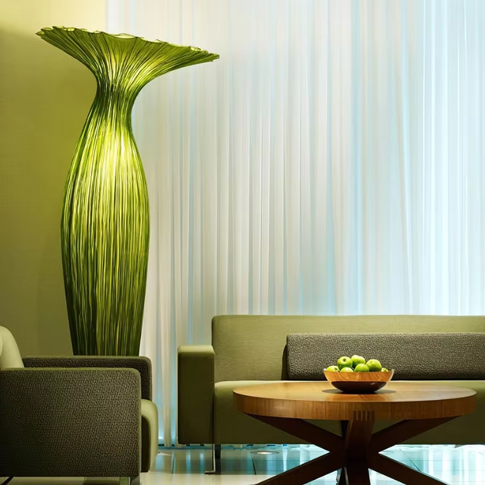 Modern art-style bud-shaped translucent floor lamp (size combination), textured material + warm yellow light effect, creating a soft artistic atmosphere.