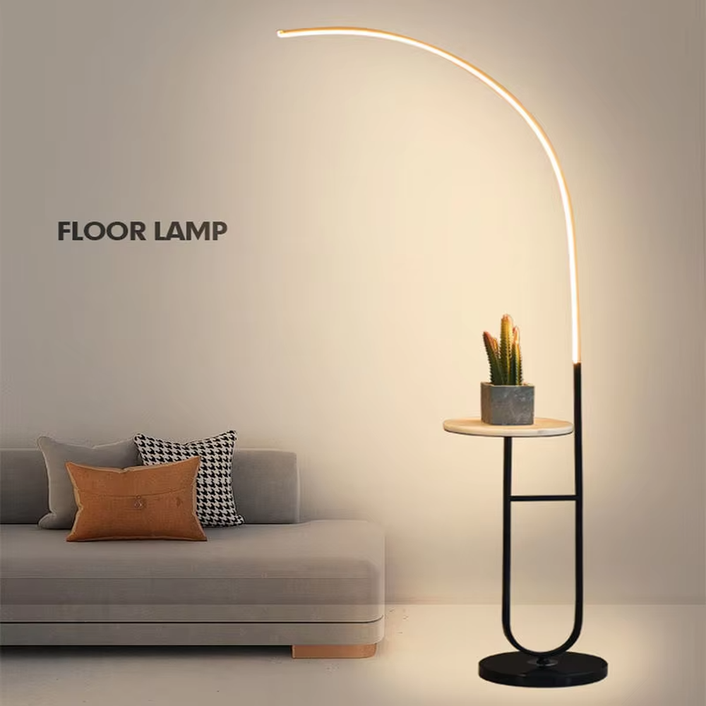 Modern curved LED strip floor lamp with side table, black metal stand + round small side table, warm light curved strip, creating a minimalist high-end atmosphere.