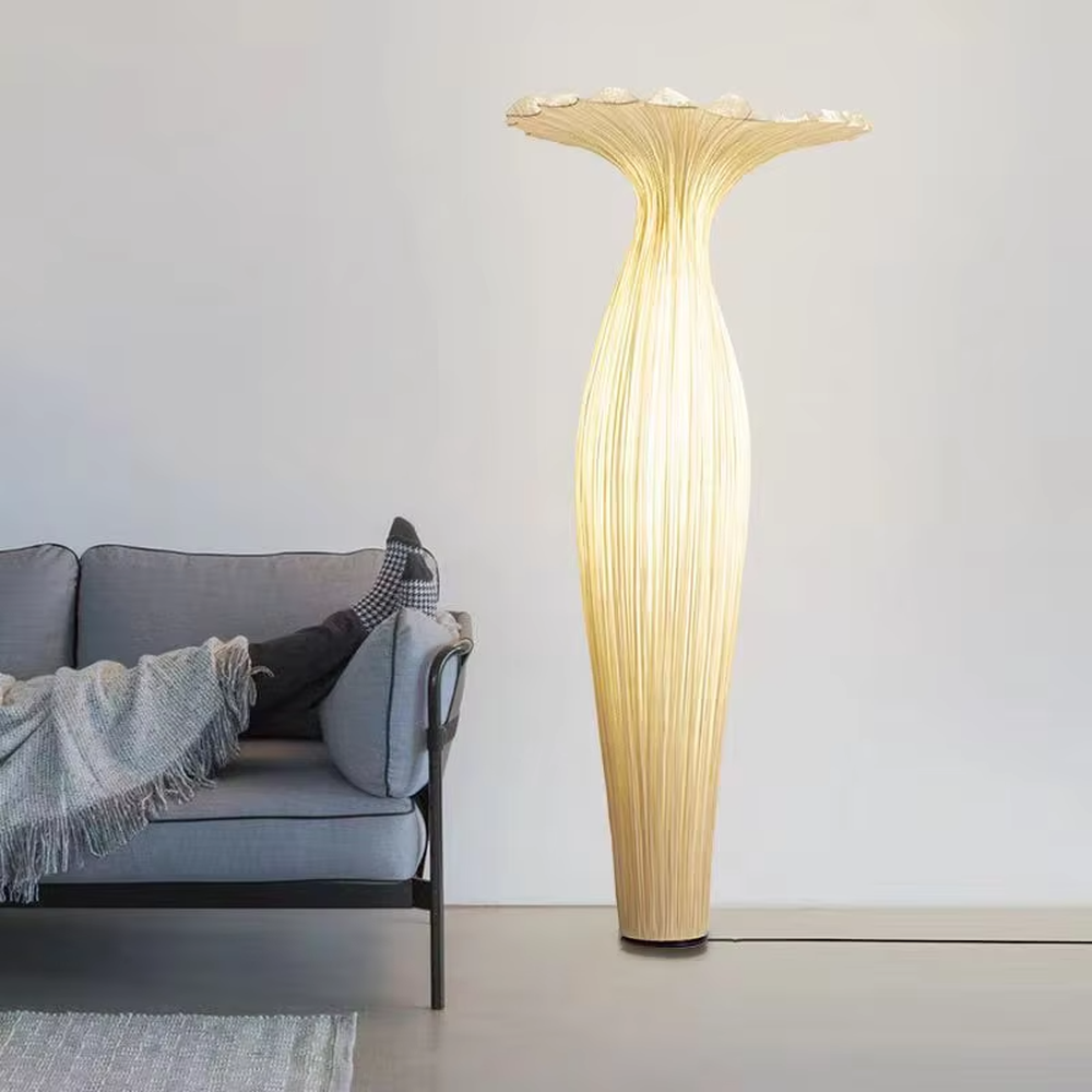 Modern art-style bud-shaped translucent floor lamp (size combination), textured material + warm yellow light effect, creating a soft artistic atmosphere.