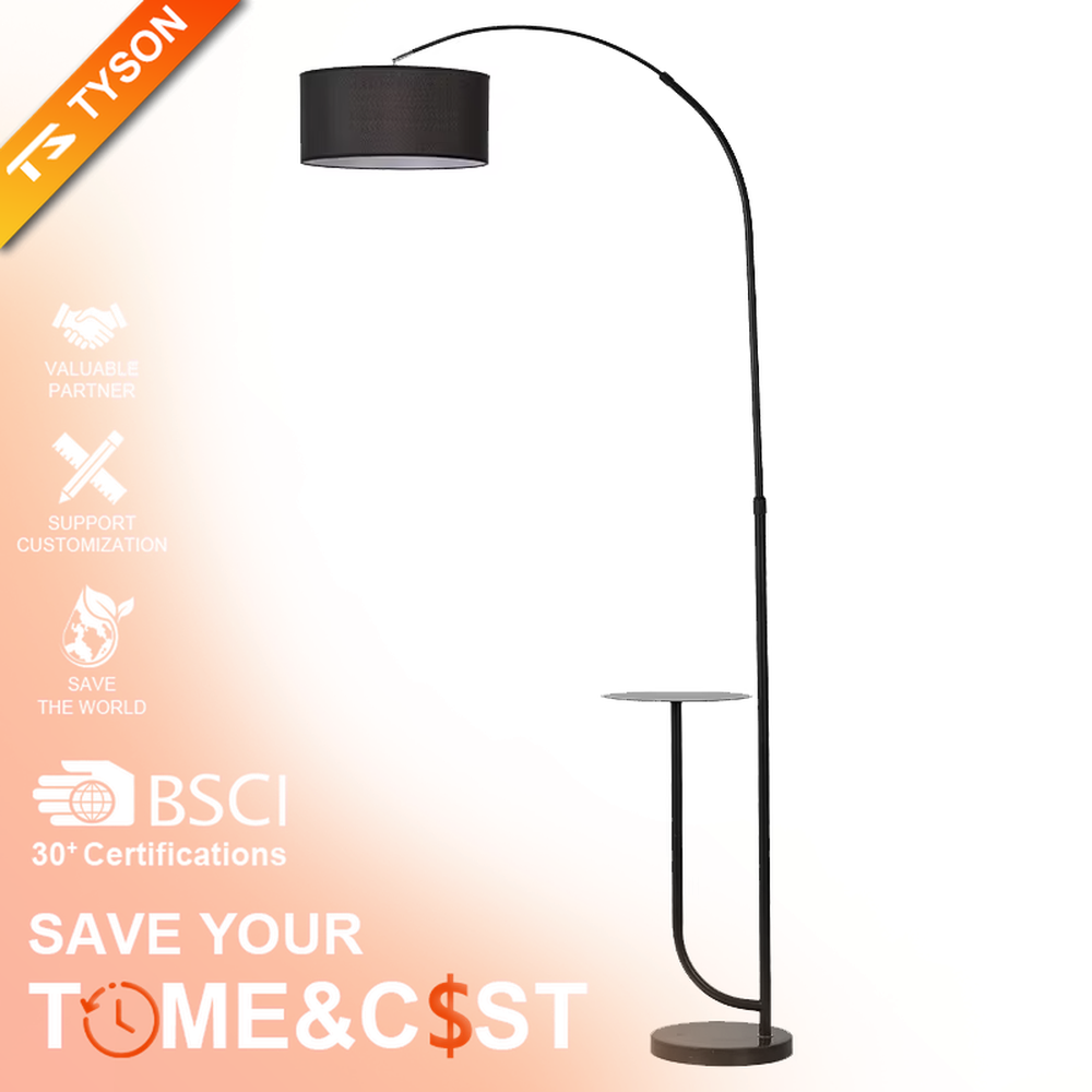 Minimalist black metal curved floor lamp with side table, black metal stand + black fabric lampshade + matching small side table, soft light, creating a minimalist high-end home atmosphere.