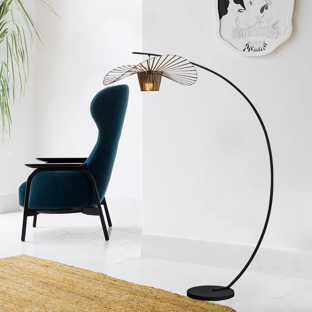 Modern art fan-shaped grid black metal curved floor lamp, black metal curved stand + fan-shaped grid lampshade + wooden lamp core, soft warm light, creating a modern art high-end atmosphere.