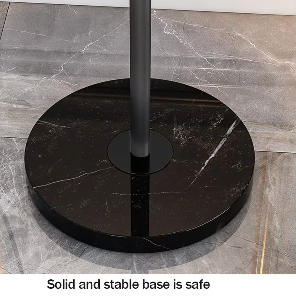 Light luxury black-gold curved LED floor lamp (with side table + drawer), black metal curved stand + gold-decor lamp head + round side table with drawer, soft warm light, creating a high-end practical light luxury atmosphere.