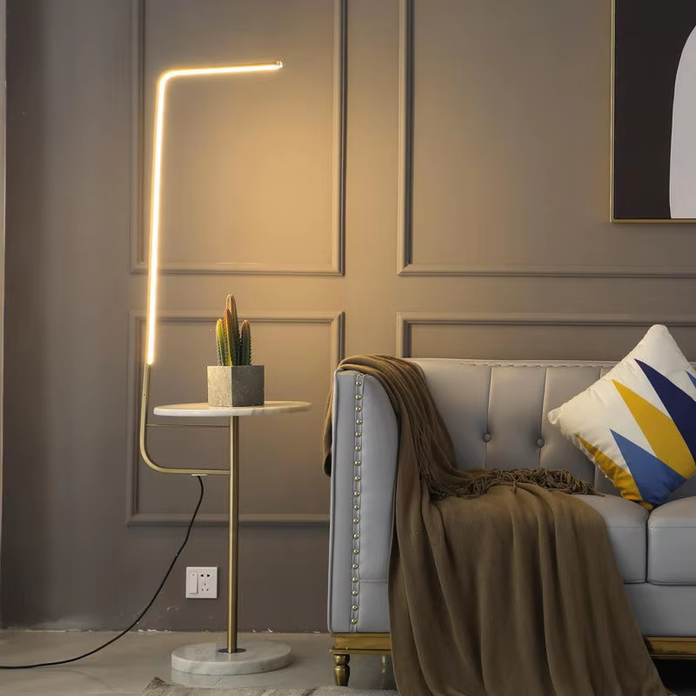 Light luxury black-gold U-shaped LED strip floor lamp with side table, black metal stand + gold strip frame + round small side table, soft warm light, creating a high-end light luxury atmosphere.