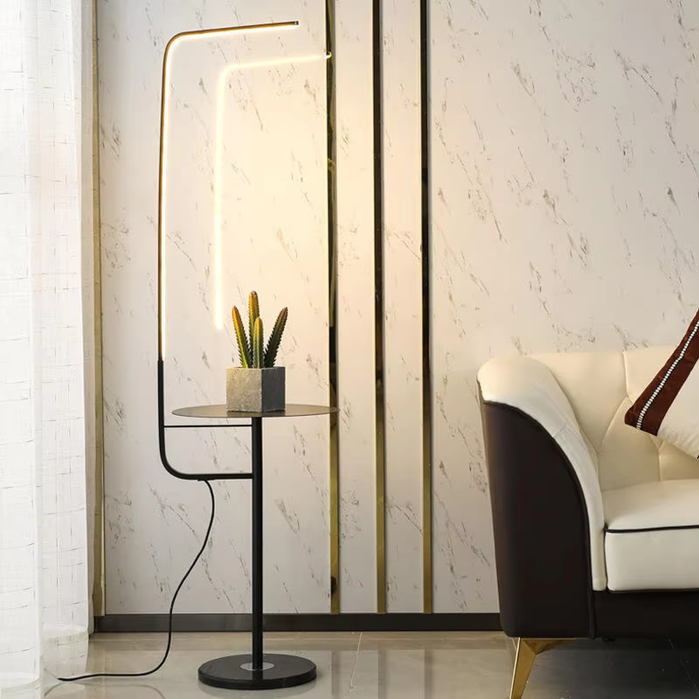 Light luxury black-gold U-shaped LED strip floor lamp with side table, black metal stand + gold strip frame + round small side table, soft warm light, creating a high-end light luxury atmosphere.