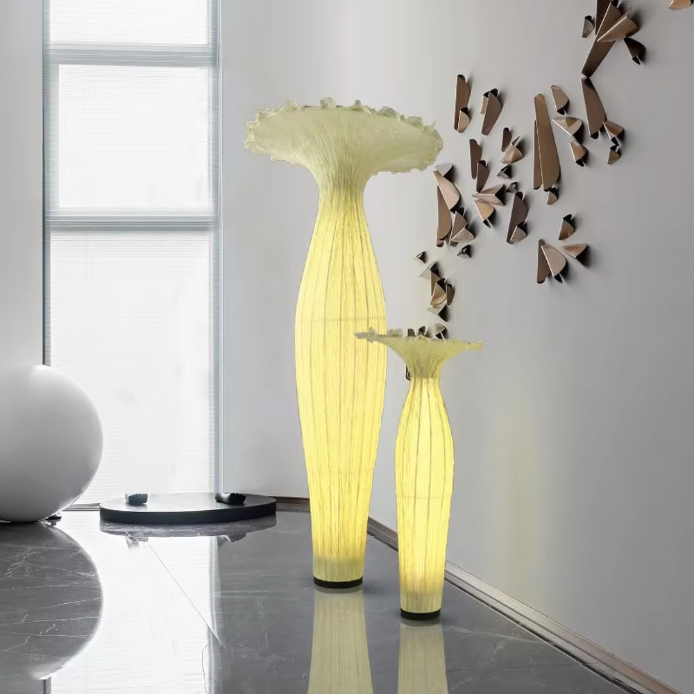 Modern art-style bud-shaped translucent floor lamp (size combination), textured material + warm yellow light effect, creating a soft artistic atmosphere.