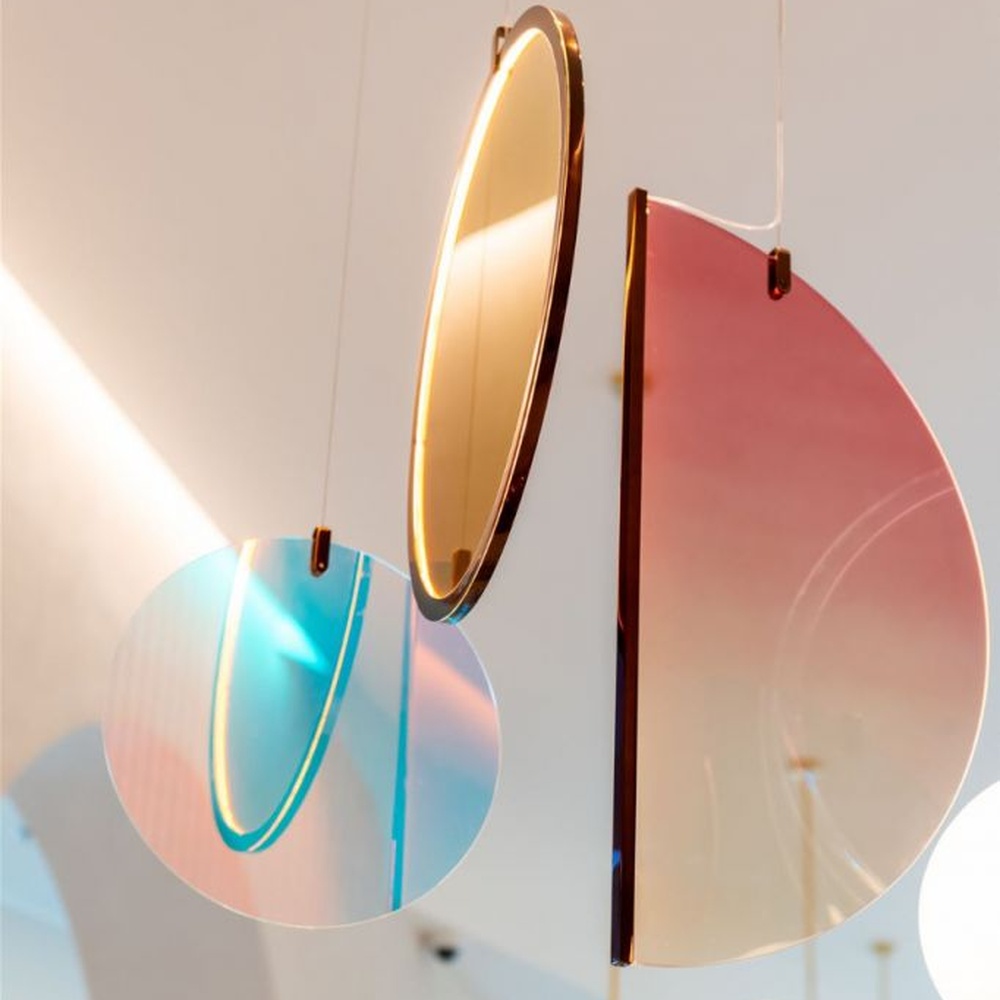 Modern Art Combination Pendant Light, Composed of Milk White Spherical Lamps, Colorful Translucent Disc Decorations and Copper Metal Frames, Serves Both Lighting and Decorative Purposes, Ideal for Art Galleries, Light Luxury Restaurants, Sales Centers, High-End Clubs, etc.