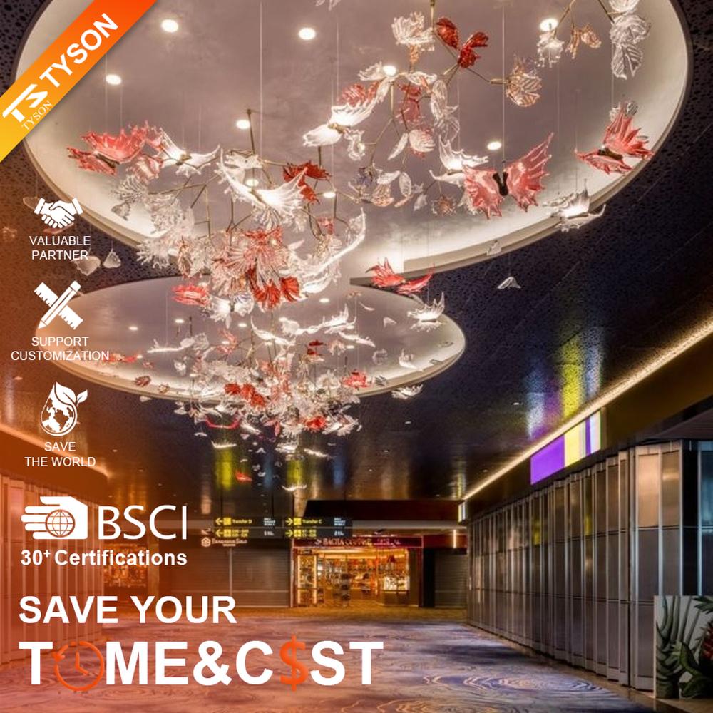 This is a customized artistic flower ceiling chandelier, composed of flower and branch-shaped components made of transparent and red-pink glass/acrylic material, paired with a circular luminous ceiling plate, which has both lighting and artistic decoration functions, suitable for large commercial spaces such as hotel lobbies, banquet halls, and high-end clubs.