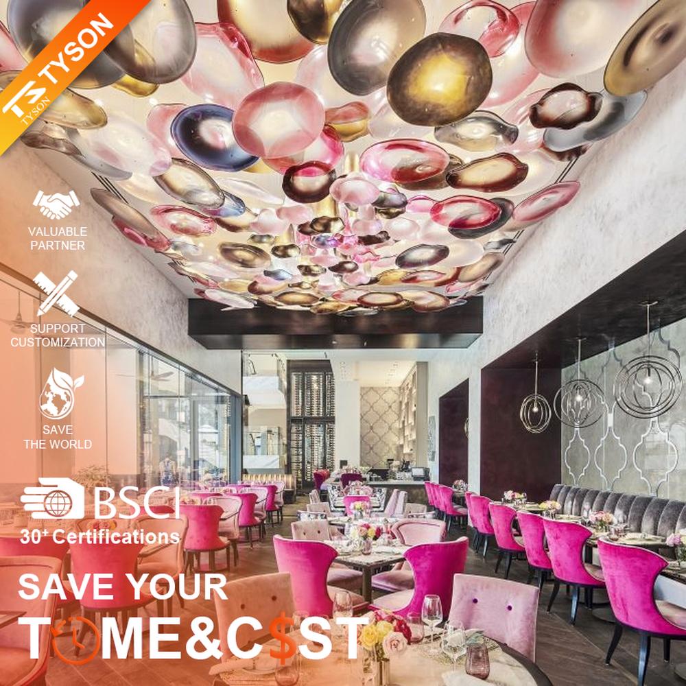 This iridescent bubble art ceiling lamp is composed of a large number of gradient-colored glass discs in pink-gold, purple-brown, etc., arranged staggered to cover the ceiling like flowing colorful light spots. Light refracts through the glass to emit a soft and transparent halo, serving both lighting and decorative purposes, suitable for trendy commercial spaces such as internet-famous restaurants and art bars.