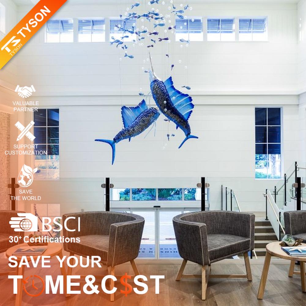 This ocean-themed art chandelier features swordfish shapes made of blue liuli, paired with bubble decorations, presenting a dynamic deep-sea swimming effect, serving both lighting and decorative purposes, suitable for coastal hotels, seafood restaurants and other spaces.