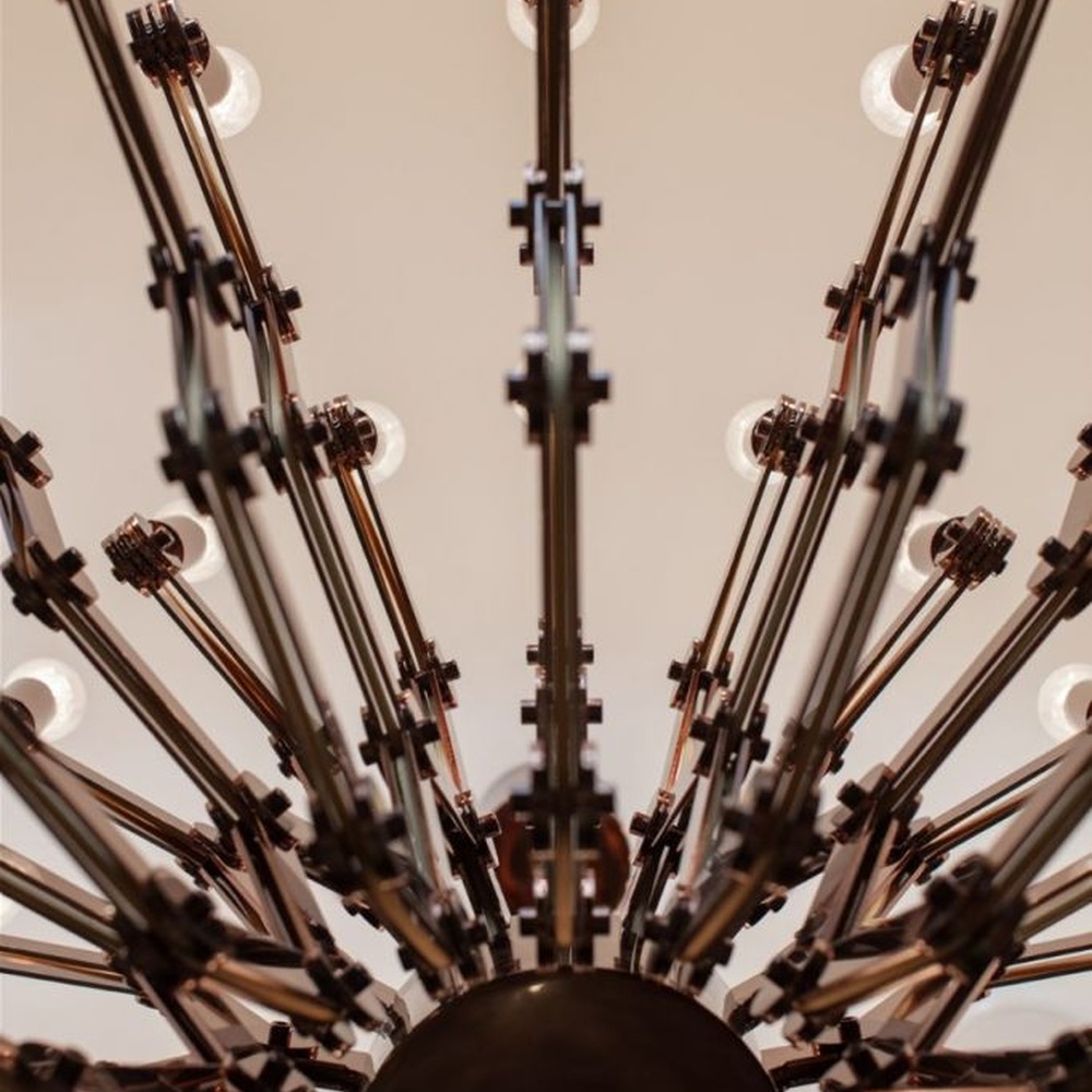 This branch-shaped multi-head chandelier features a fork-shaped lamp frame made of wood-like material, paired with multiple groups of staggered light-emitting lamp heads, presenting a visual effect that combines natural artistry and modern industrial style, suitable for core lighting and decoration in high-ceiling public spaces.