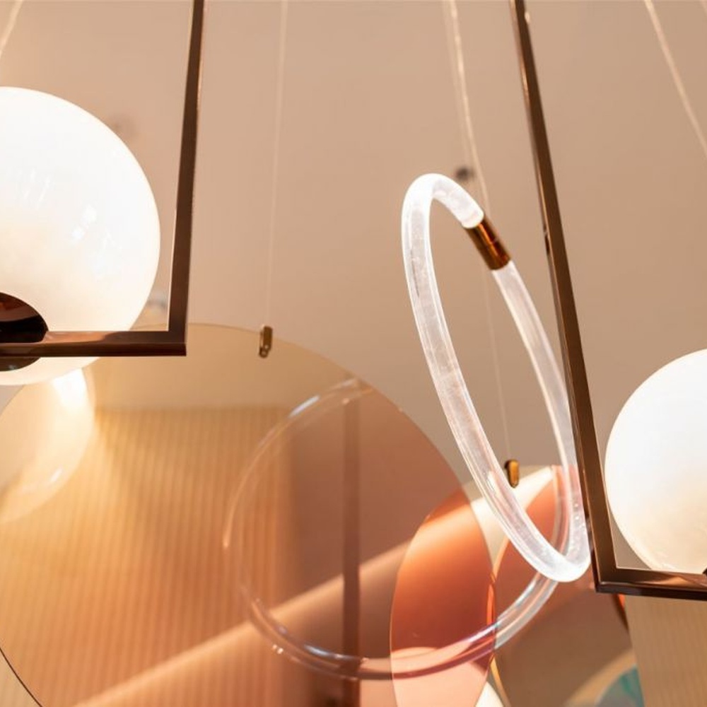 Modern Art Combination Pendant Light, Composed of Milk White Spherical Lamps, Colorful Translucent Disc Decorations and Copper Metal Frames, Serves Both Lighting and Decorative Purposes, Ideal for Art Galleries, Light Luxury Restaurants, Sales Centers, High-End Clubs, etc.