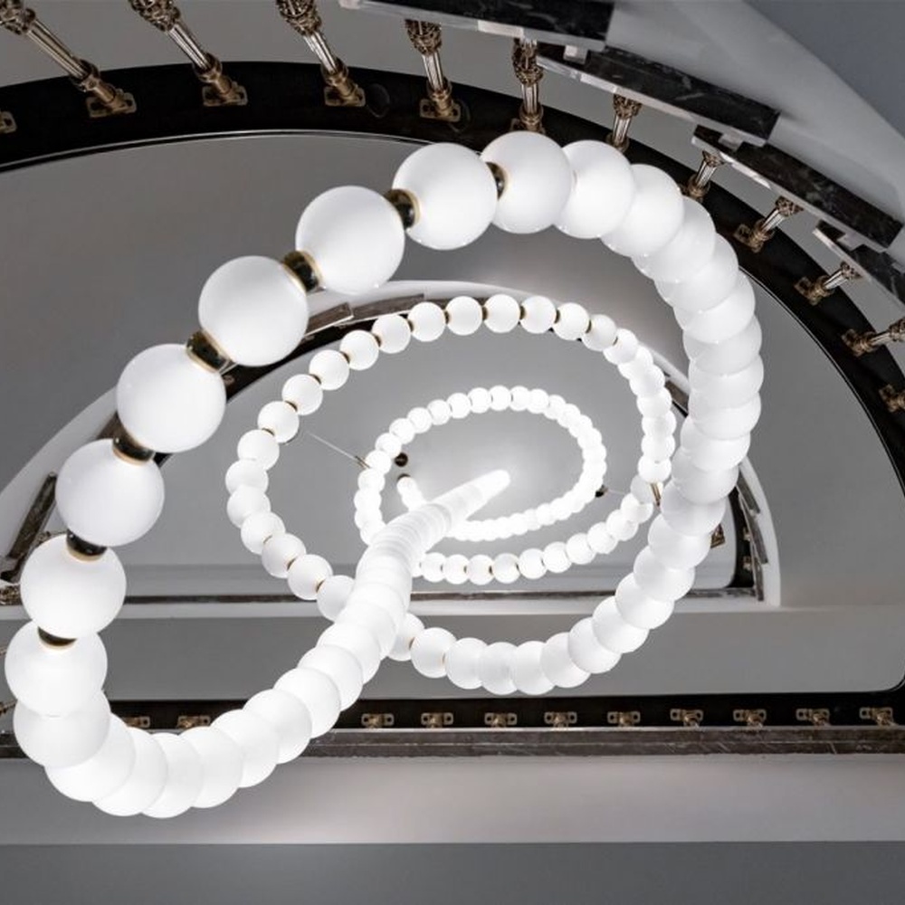 Modern Art Spiral Beaded Chandelier, Composed of Milk White Spherical Lamps Connected in a Spiral Shape Following Staircase Curves, with Gold Metal Details, Serves Both Lighting and Decorative Purposes, Ideal for Villa Spiral Staircases, High-Ceiling Halls, Luxury Hotel Lobbies, etc.
