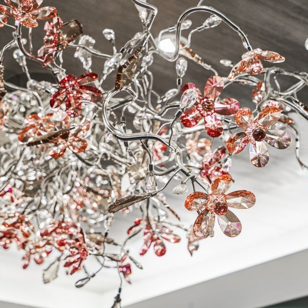 This iridescent bubble art ceiling lamp is composed of a large number of gradient-colored glass discs in pink-gold, purple-brown, etc., arranged staggered to cover the ceiling like flowing colorful light spots. Light refracts through the glass to emit a soft and transparent halo, serving both lighting and decorative purposes, suitable for trendy commercial spaces such as internet-famous restaurants and art bars.