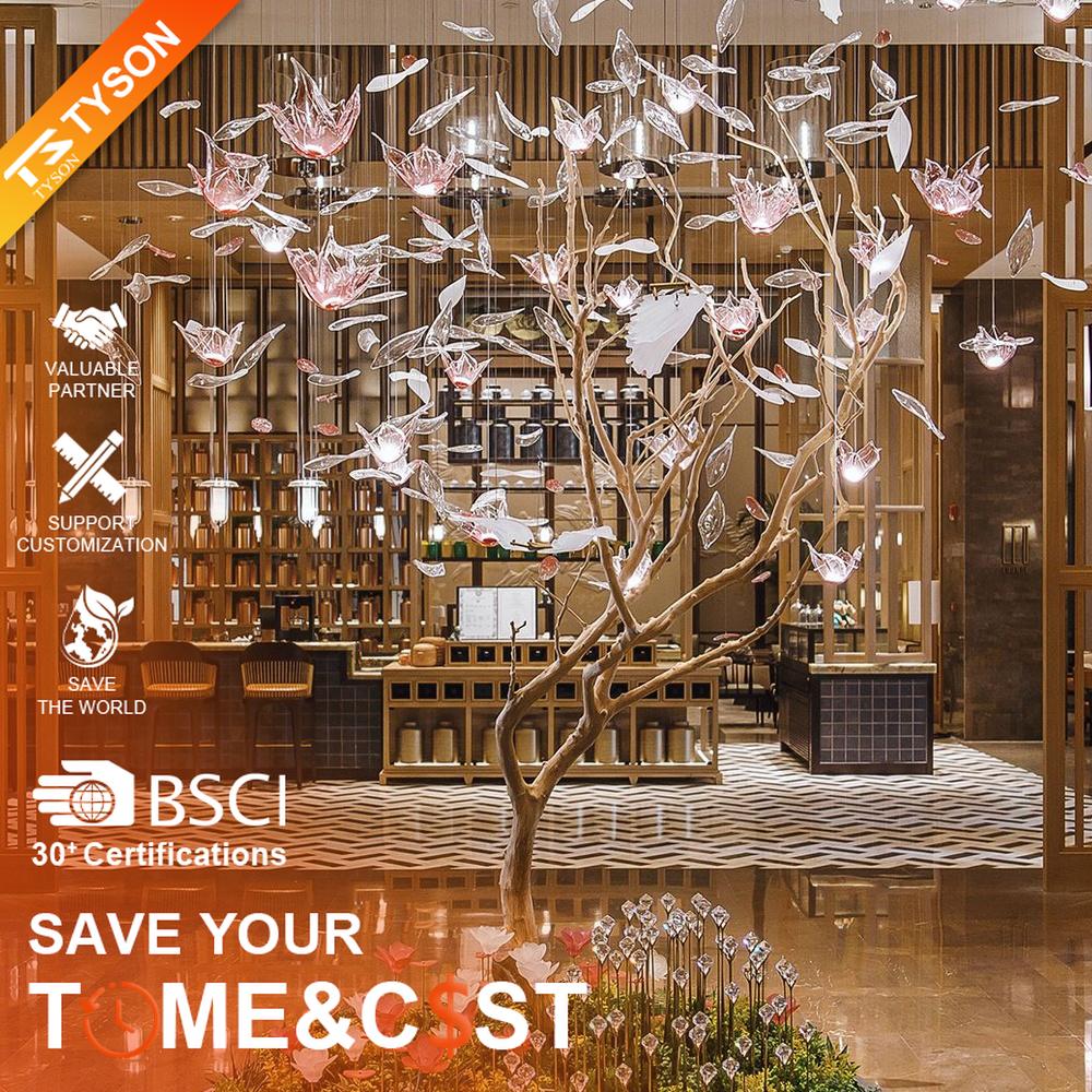 This is an art-installation style tree-shaped chandelier, with a simulated branch as the main structure, paired with transparent and pink-white gradient leaf-shaped luminous components, which has both artistic decoration and soft lighting functions, suitable for large commercial spaces such as hotel lobbies, high-end clubs, and art exhibition halls.