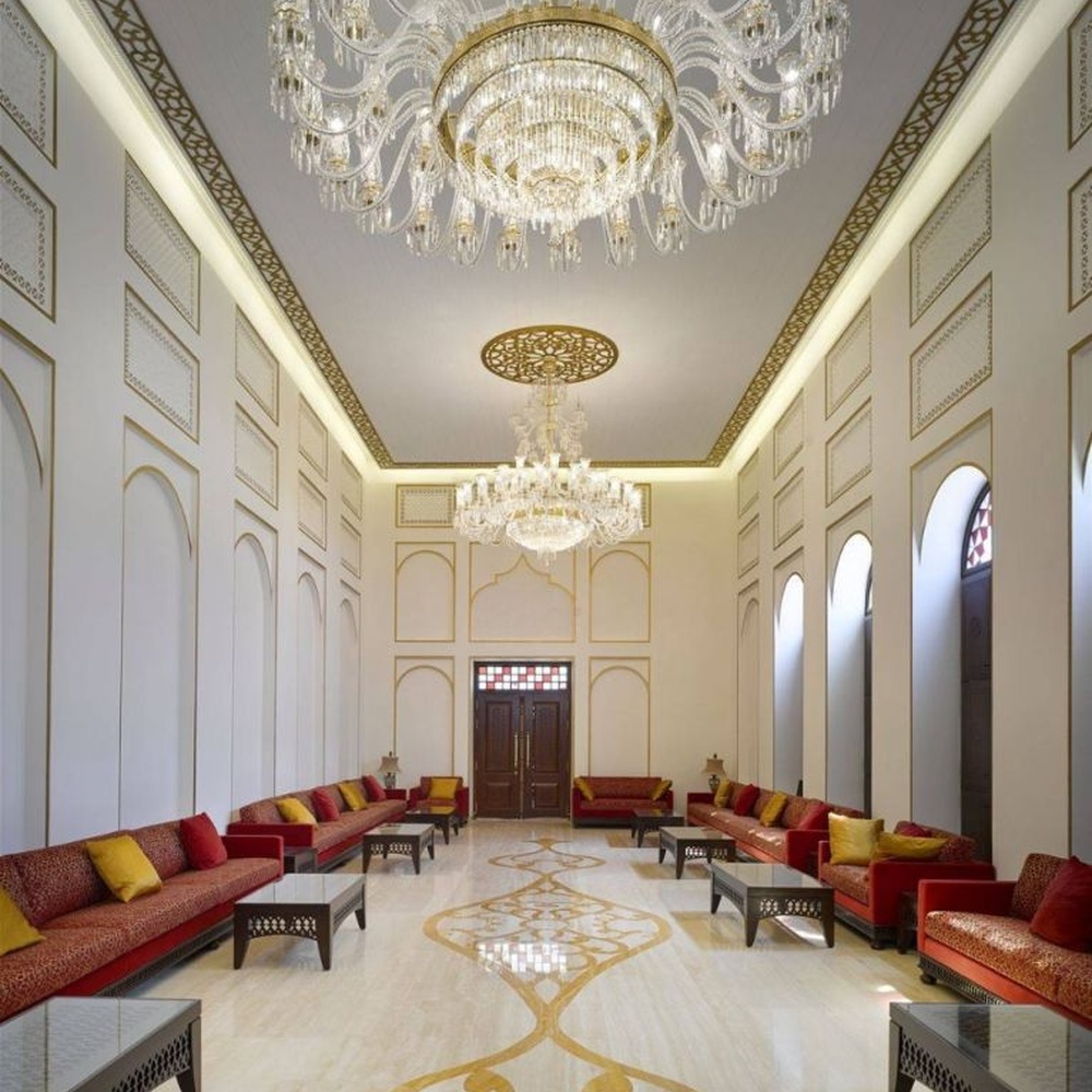 This Islamic-style large multi-layer crystal chandelier features a luxurious shape made of a gold metal frame and faceted crystals, with light refracting a brilliant halo through the crystals, serving both lighting and decorative purposes, suitable for luxurious religious or commercial spaces such as mosques and high-end hotel lobbies.