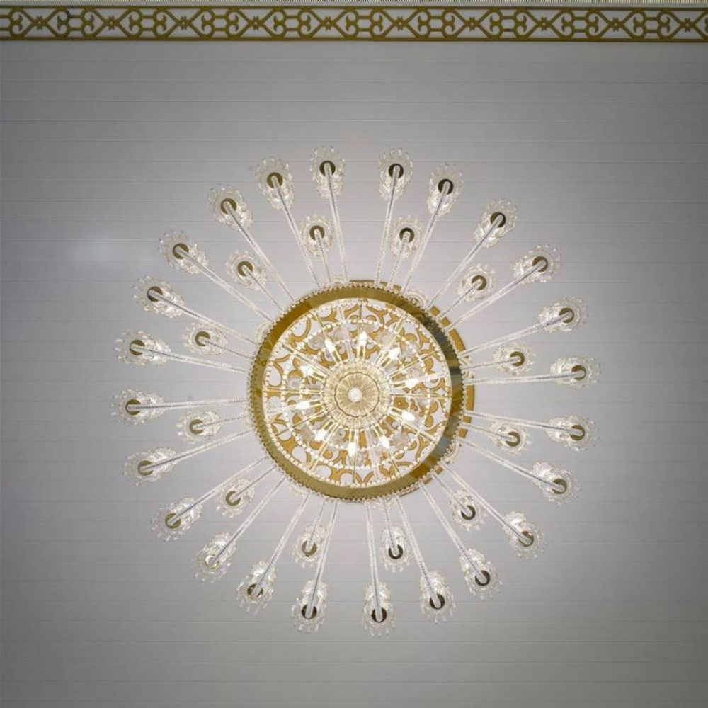 This Islamic-style large multi-layer crystal chandelier features a luxurious shape made of a gold metal frame and faceted crystals, with light refracting a brilliant halo through the crystals, serving both lighting and decorative purposes, suitable for luxurious religious or commercial spaces such as mosques and high-end hotel lobbies.