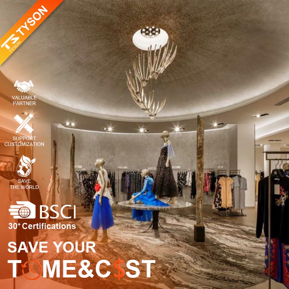 This light luxury art branch chandelier features a bionic branch shape made of metal, paired with transparent crystal strips, with light refracting a soft halo through it, serving both lighting and decorative purposes, suitable for high-end clothing stores, exhibition halls and other commercial spaces.