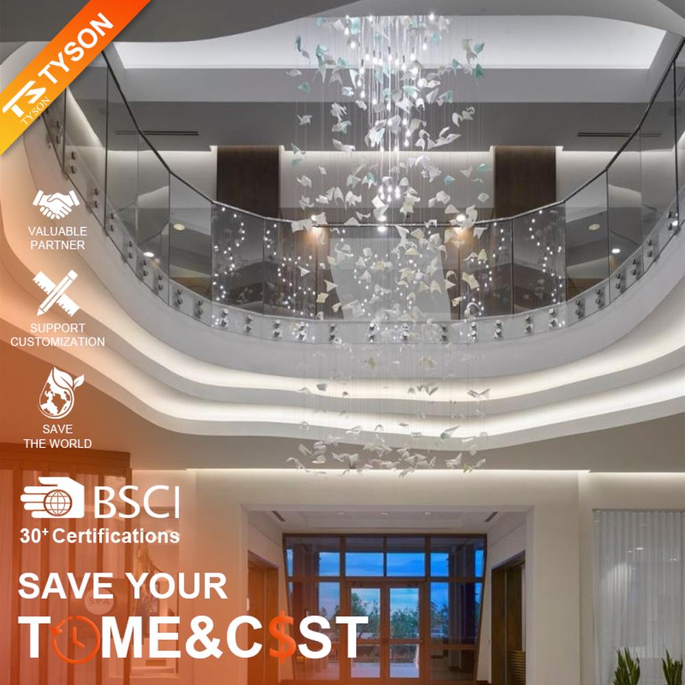 This large butterfly crystal art chandelier features a drooping shape made of transparent butterfly-shaped ornaments and crystal beads, with light refracting a soft halo through it, serving both lighting and installation art purposes, suitable for high-end luxury spaces such as hotel lobbies and high-ceiling clubs.
